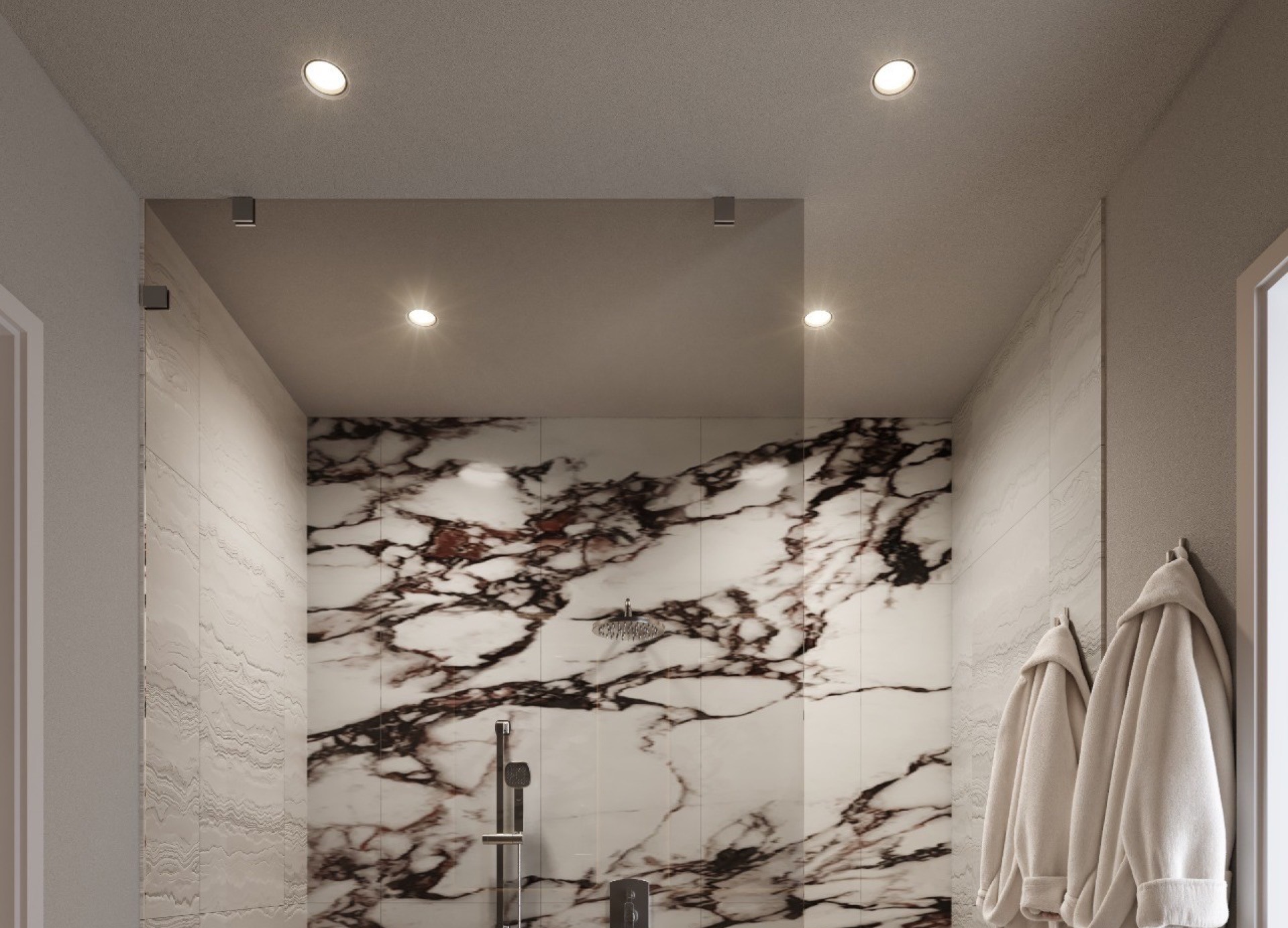 Primary bathroom shower at The Lincoln Coconut Grove Residences — floor-to-ceiling glass shower panels with premium Brizo fixtures and elegant Toto toilet.