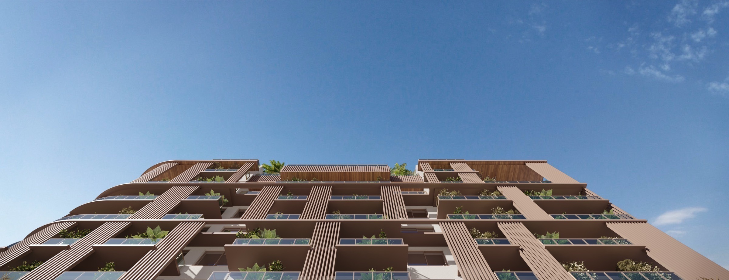 Vertical exterior view of The Lincoln Coconut Grove Residences — a boutique residential tower set among the Coconut Grove canopy.